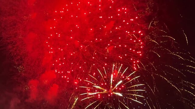 Colorful American fireworks against a dark sky. Fourth of July. The 250th Anniversary of the United States. 250 years of independence. July 4, 2026, is U.S. Independence Day. Footage