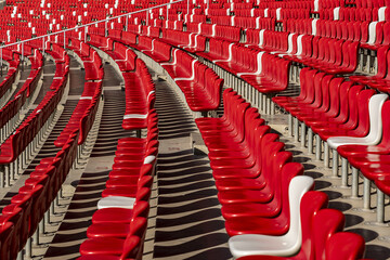 Olympic Stadium Seating - Red and White Rows of Empty Seats © LyVan