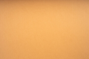 Fototapeta premium Paper texture overlay on solid orange background, minimalist surface design