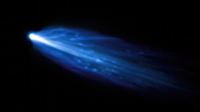 Astounding Blue Comet Tail Streaking Across Deep Space with Nebulous Glow