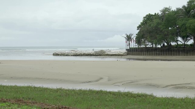 Landscape view at beach sea in stormy weather after rain stopped in Khao Lak area in south of Thailand.sea beach in rainy day with heavy strong wind blowing