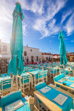 Ayvalik - Turkey, May 17, 2026, Outdoor Seating Area of Traditional Greek Style Seafood Restaurant on Cunda Island