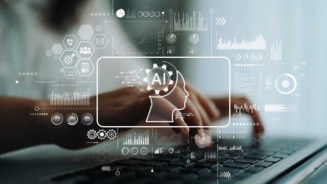 Hands typing on laptop with digital AI symbols and data analytics graphics in a modern workspace. Asymptotic smart data analytic.