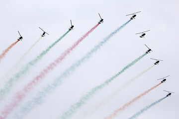 Helicopter Formation Airborne Display with Colorful Smoke © PhamHong