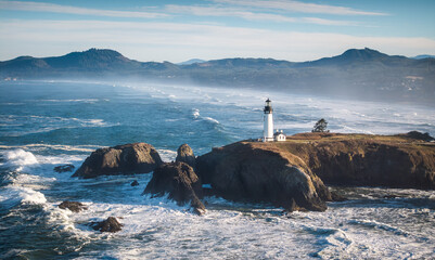 Aerial view of the natural scenery along the coastline of Cape Aquinas Lighthouse, Oregon, USA. © Chenxiaoyang