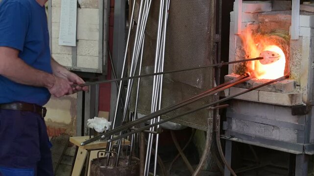Murano Glass Master Shaping Molten Glass Inside Venetian Glass Factory