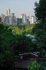 Fototapeta premium A scenic view of Lumpini Park, taken from the Dusit Central Park viewpoint, a favorite landmark for tourists and travelers.