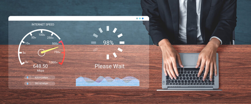 A professional man is engaged in work on his laptop while an internet speed test displays important metrics and a loading animation in a sleek office setting. Ledger