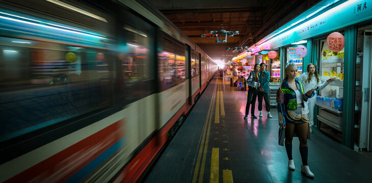 Blurry motion of a subway train arriving at a brightly lit station platform with people waiting at night motion blur neon lights public transport light trails busy station long exposure