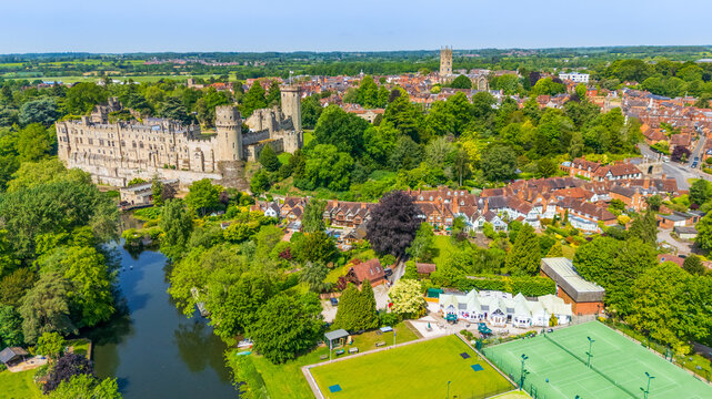 Aerial view of the town of Warwick in Warwickshire, UK with the popular castle, cathedral and racecourse on a Spring day