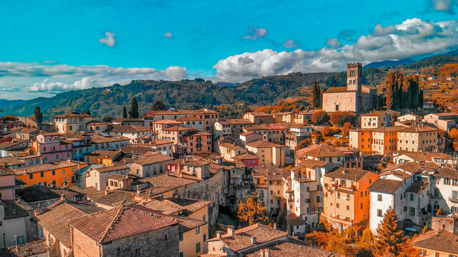 Beautiful aerial view of Barga, nestled in the Garfagnana valley, bathed in sunlight