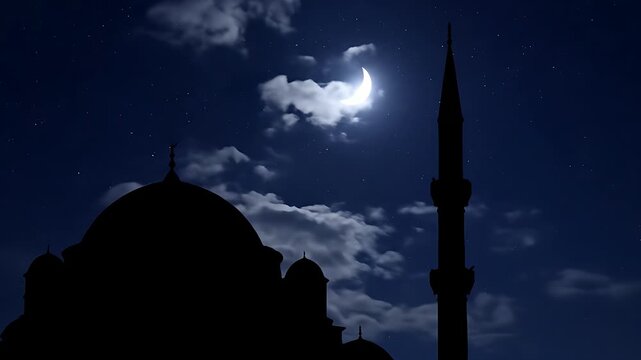 Silhouette of a mosque dome and minaret under a crescent moon and starry sky. Peacefully moving clouds accent the Islamic architecture at night. Ideal for Ramadan and Eid religious marketing.
