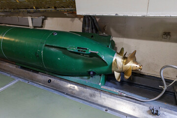 Military torpedo with propeller in a former submarine © sissoupitch