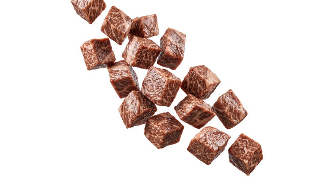 Falling fresh raw beef cubes isolated on white background