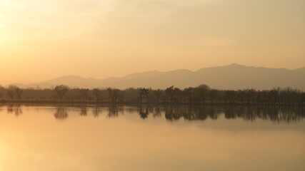 Fototapeta premium The beautiful sunset view in the Summer palace of Beijing in the winter 