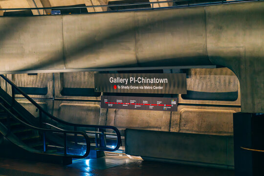 The station sign for Gallery Place-Chinatown shows Red Line direction and route details.