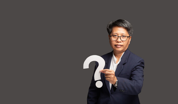 Female Executive Holding Question Mark Symbol