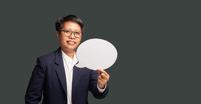 Female Executive Holding Empty Speech Bubble