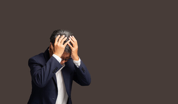 Business woman stressed and holding head in office studio
