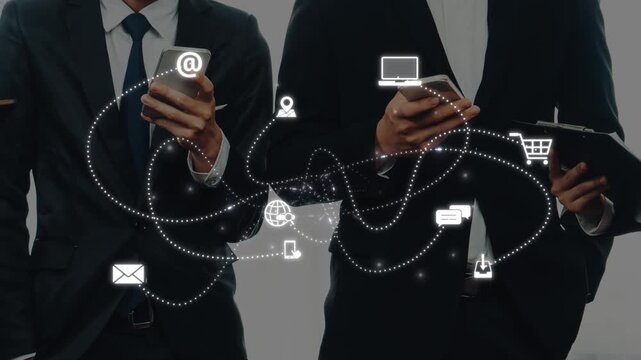 A diverse business team engages with mobile devices, representing modern communication strategies. Digital icons illustrate the integration of technology in today workplace. Raster