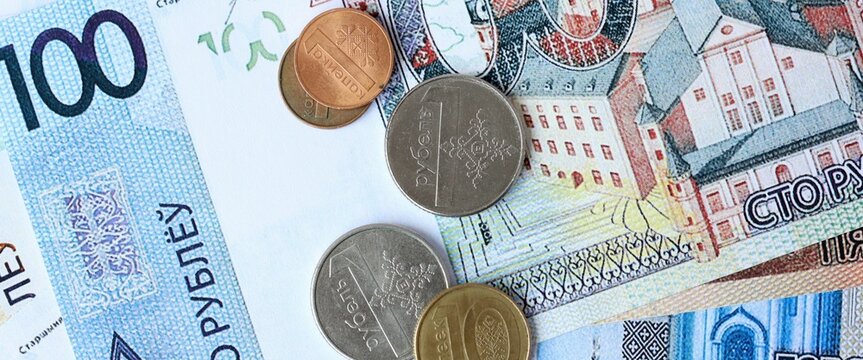 Belarusian ruble money bills and coins on table. Belarus cash of BYN currency close up