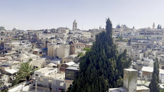 Jerusalem, Israel, 18 May 2026, view from the rooftop of the Austrian Hospice overlooking the city, churches, and mosques on a sunny day.