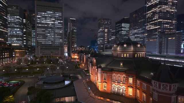 (SDR 709 10bit 4:2:2) - 4K Video of Tokyo Station Marunouchi South Entrance at Night with Illuminated Historic Facade and Modern Cityscape