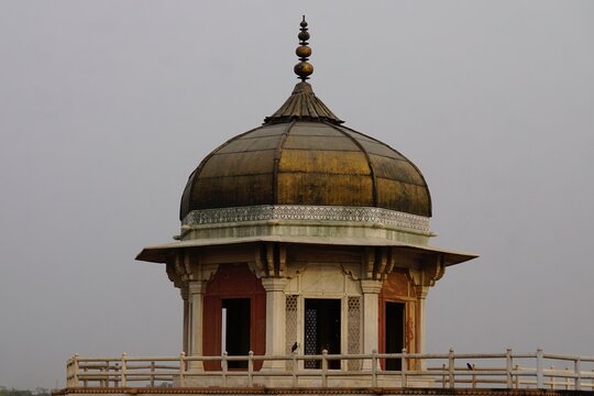 Historic octagonal tower of Musamman Burj at Agra Fort displaying fine Mughal craftsmanship and imperial Indian architecture.                             