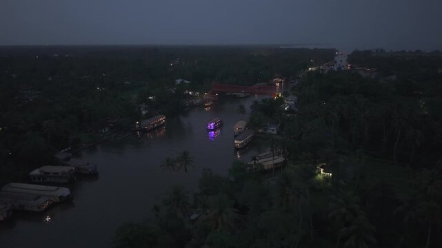 Aerial drone view of traditional houseboats on Kerala backwaters, Alappuzha, India.
