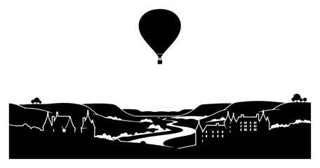 Hot air balloon silhouette flying over scenic river valley landscape © Cristiano