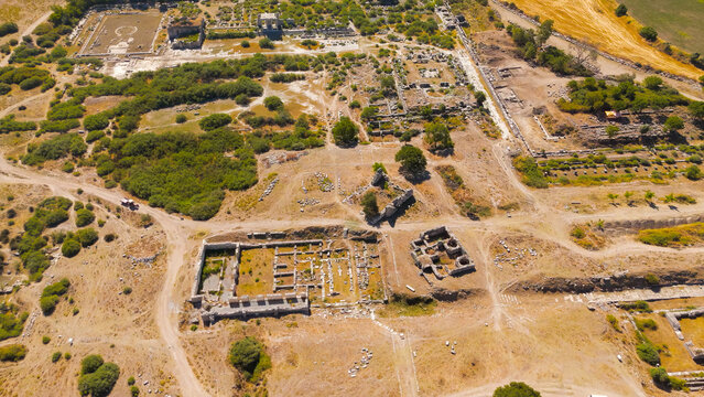 Balat, Turkey. Aerial drone view of the Bouleuterion council house and North Agora market in the ancient city of Miletus. Aerial View