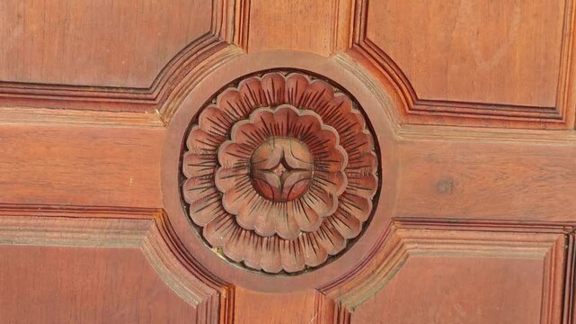 Wood carvings with traditional Thai patterns.