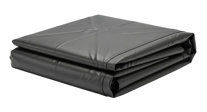 Folded black plastic tarp for industrial or construction site protection