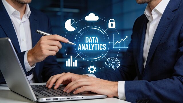 Two businessmen working on laptop with data analytics hologram interface, cloud computing security graph charts, big data analysis, corporate strategy planning meeting discussion