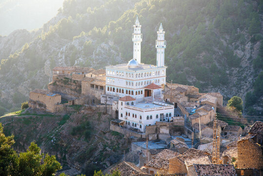 Mosque Inside a Forest in Algeria Scenic mountain forest village with a traditional Algerian mosque and stone architecture