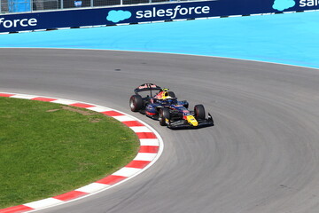 Obraz premium May 22, 2026, Montreal, Canada, F1 Academy car races through Circuit Gilles Villeneuve during Grand Prix weekend. g.