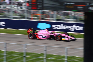 Obraz premium May 22, 2026, Montreal, Canada, F1 Academy car races through Circuit Gilles Villeneuve during Grand Prix weekend. g.