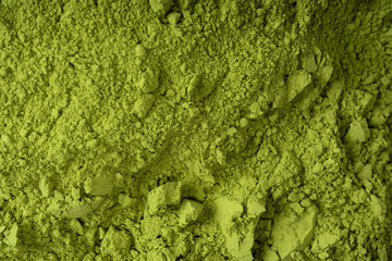 Naklejka na ściany i meble Matcha tea, matcha powder as a background.