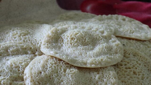 Stack of Baghrir Moroccan honeycomb pancakes close-up macro
