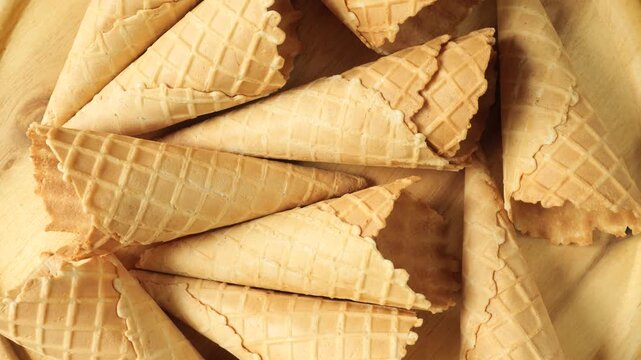 Crispy sweet empty waffle cones background