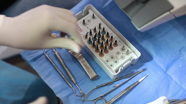 Busy Dental Professionals Setting Up Sterilized Surgical Equipment With Precision And Care