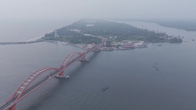 Aerial drone view of Thanneermukkom Bund, bridge located in Alappuzha and Kottayam Kerala, India 

