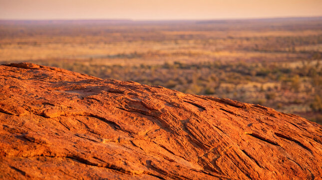 Uluru red rock texture Australian outback sandstone sacred landscape travel close surface detail and desert light communicate ancient geology remote place identity and respectful travel storytelling