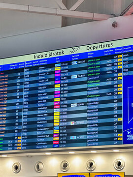 Budapest, Hungary - May 8, 2026: Departure information board displaying scheduled international flights and check-in status inside Budapest Ferenc Liszt International Airport.