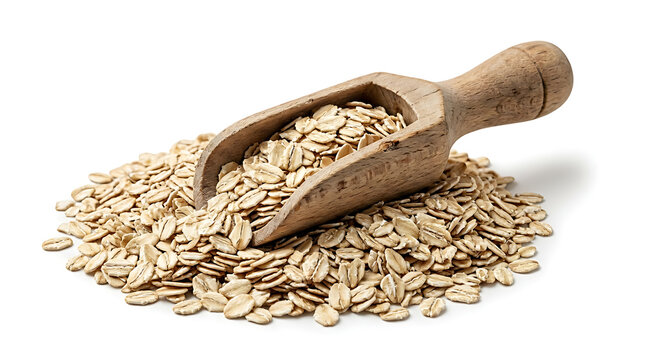Buckwheat grains in a wooden spoon, healthy organic raw cereal seeds on white background