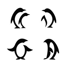 Naklejka premium Set of Stylized Black Penguin Silhouette Logos and Icons for Branding and Graphic Design Projects