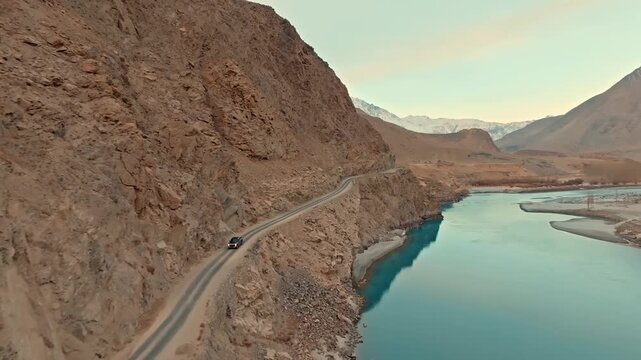Aerial View of Vehicle on Mountain Road by Shyok River, Indus River Ghanche,  Baltistan, Gilgit-Baltistan, Pakistan