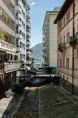 Fototapeta premium Panoramic view of Locarno in Ticino, Switzerland, surrounded by the majestic Alps. Beautiful cityscape and mountain scenery in the Italian-speaking region of Switzerland.