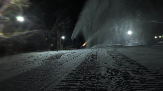 Snowstorm Around Illuminated Silent Landscape. Breezy Evening With Swirling Snow And Shadows Cast