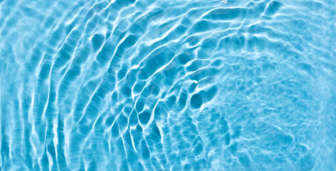 Abstract Blue Water Ripples Creating a Calming and Serene Aquatic Texture © Svetlana Kolpakova